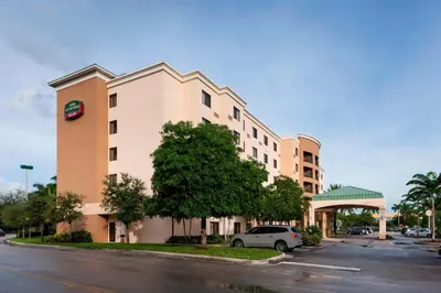 a car parked in front of a hotel at Courtyard by Marriott Miami at Dolphin Mall in Miami