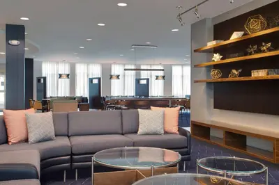 a living room with a couch and tables at Courtyard Fort Lauderdale SW Miramar in Miramar