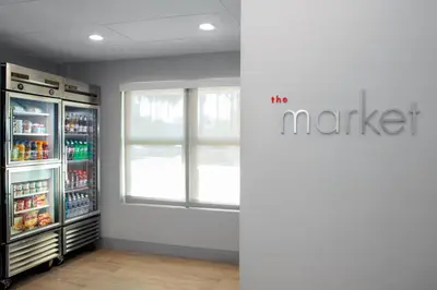 a large refrigerator in a store with a window at Courtyard by Marriott Miami Aventura Mall in Aventura