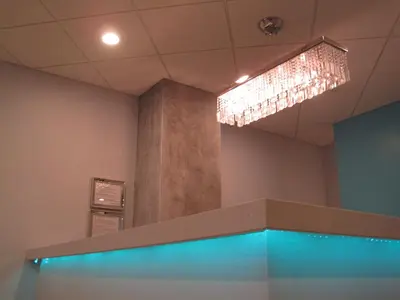 a chandelier hanging from a ceiling in a room at Miami Sun Hotel - Downtown/Port of Miami in Miami