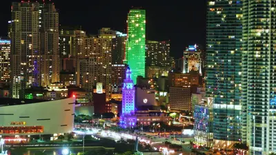 a city lit up at night with lights at Miami Sun Hotel - Downtown/Port of Miami in Miami