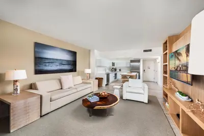 a living room with a couch and a table at Oceanview Private Condo at 1 Hotel & Homes -1408 in Miami Beach