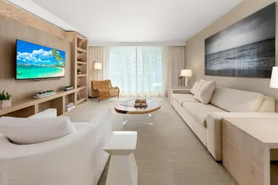 a living room with a couch and a table at Oceanview Private Condo at 1 Hotel & Homes -1408 in Miami Beach