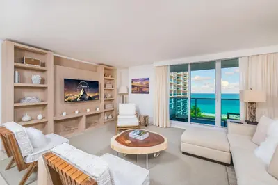 a living room with a couch and a table at Oceanview Private Condo at 1 Hotel & Homes -1040 in Miami Beach