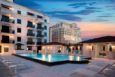 a swimming pool in the middle of a building at Aloft Coral Gables in Miami