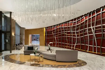 a lobby with a large mural of the american flag at JW Marriott Marquis Miami in Miami
