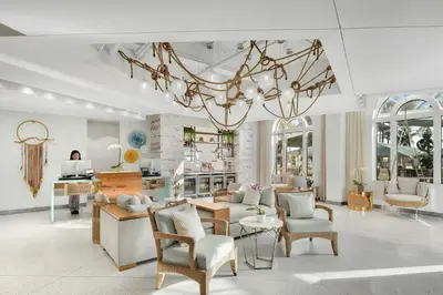 a large living room with a chandelier at Marriott Vacation Club, South Beach in Miami Beach