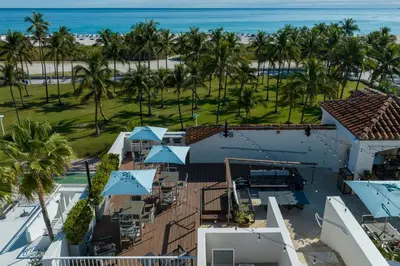 an aerial view of a resort with palm trees and the ocean at Marriott Vacation Club, South Beach in Miami Beach