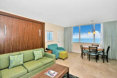 a living room with a couch and a table at Hollywood Beach Tower in Hollywood