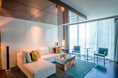 a living room with a couch and a table at Hotel Beaux Arts, Autograph Collection in Miami