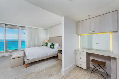 a bedroom with a bed and a view of the ocean at Oceanview Private Condo at 1 Hotel & Homes -1122 in Miami Beach
