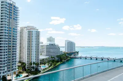 a view of a city with tall buildings and the water at W Miami in Miami