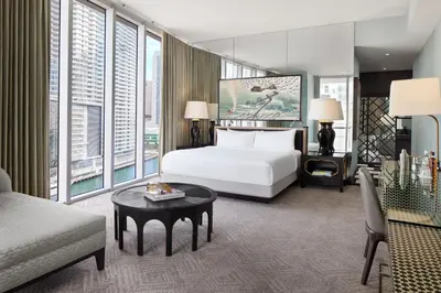a hotel room with a bed and a table at W Miami in Miami