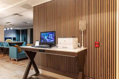 an office with a desk with a computer on it at Hampton Inn & Suites Miami Airport South/Blue Lagoon in Miami