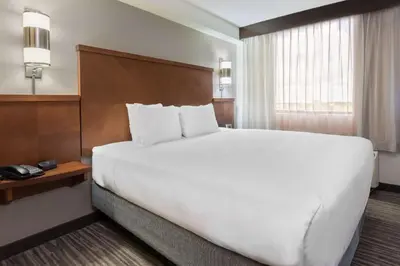 a large white bed in a hotel room at Hyatt Place Ft. Lauderdale/Plantation in Plantation