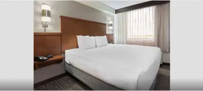a large white bed in a hotel room at Hyatt Place Ft. Lauderdale/Plantation in Plantation
