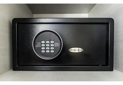 a television with a remote control on a wall at Global Rent Apart - Costa Hollywood in Hollywood