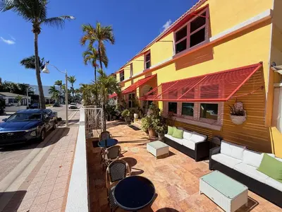 a building with a car parked in front of it at Sinclair Boutique Hotel in Hollywood