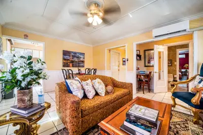 a living room with a couch and a table at Sinclair Boutique Hotel in Hollywood