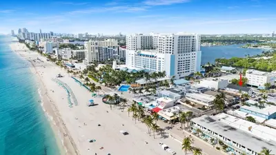 an aerial view of a beach and buildings at Modern Loft wBed Steps from Beach Boardwalk in Hollywood