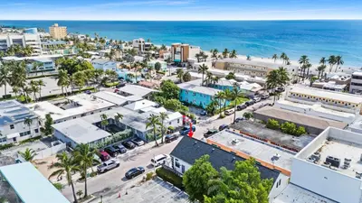 an aerial view of a city with the ocean at Modern Loft wQueen Loft Steps to Beach in Hollywood