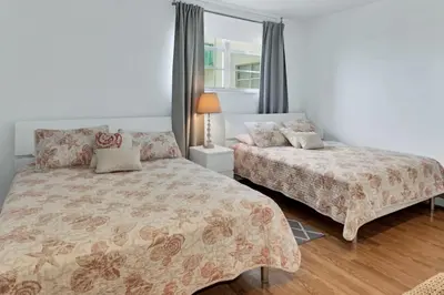 a bedroom with two beds and a window at THE TIDES 1bedroom apt 15th floor WE ARE ON THE BEACH! in Hollywood