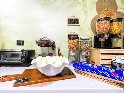 a table with a bowl of eggs on a cutting board at Hollywood Beach Hotels in Hollywood