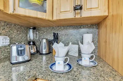 a kitchen with two coffee mugs on a counter at THE TIDES 1 bedroom apt 10 floor WE ARE ON THE BEACH! in Hollywood