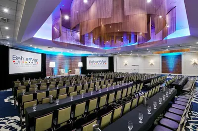 a conference room with rows of chairs and a stage at Bahia Mar Fort Lauderdale Beach - DoubleTree by Hilton in Fort Lauderdale