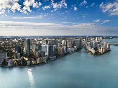 an aerial view of a large city with buildings at Signature Suite at Four Seasons Residences - Limited Time Offer in Miami