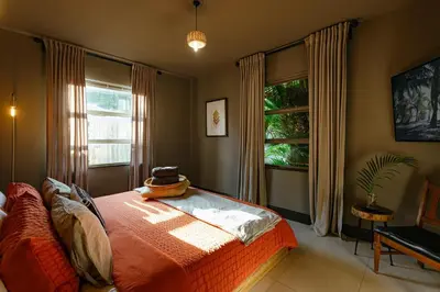 a bedroom with a bed and a window at Casa del Ojo- Heated Pool - 3 King beds in Fort Lauderdale