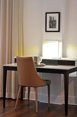 a chair sitting in front of a desk at Hotel St. Michel in Miami