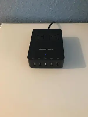 a black router sitting on top of a table at Sun Beach Inn in Hollywood
