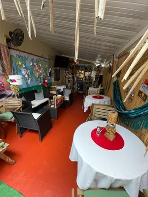 a restaurant with a table and chairs in a room at Habitación Céntrica calle 8 Miami in Miami