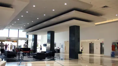 a lobby with chairs and tables in a building at Casablanca on the beach, Oceanfront Studio Miami Beach in Miami Beach