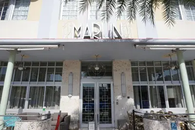 a building with a sign that reads marlin at The Marlin Hotel in Miami Beach