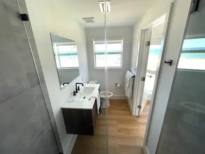 a bathroom with a sink and a mirror at Shore View Hotel in Hollywood