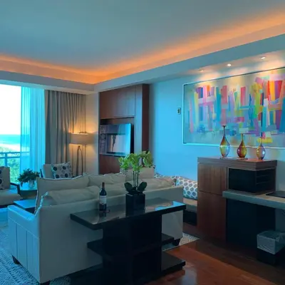 a living room with a couch and a table at One Bal Harbour Ritz Bal Harbour in Miami Beach