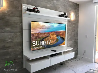 a flat screen tv sitting on a wall at Yacht Club at Aventura 2 Bed 2 bath Luxurius Cozy Brand New in Aventura