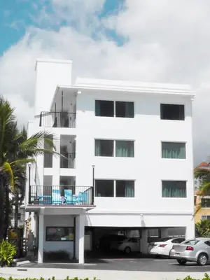 a white apartment building with a balcony at Snooze in Fort Lauderdale