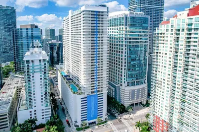 an aerial view of a city with tall buildings at Miami Brickell 4 Bedrooms High Ceiling loft on the pool in Miami