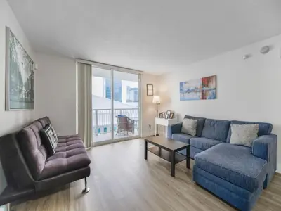 a living room with a couch and a table at Gorgeous apartment in Brickell in Miami