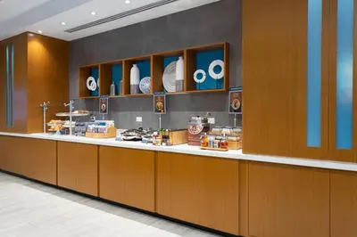 a food counter in a restaurant with an oo sign at SpringHill Suites by Marriott Fort Lauderdale Miramar in Miramar