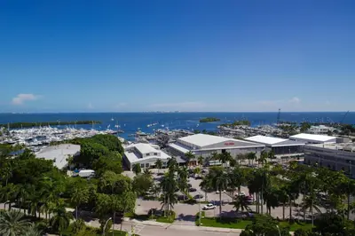 an aerial view of a parking lot with a marina at Courtyard Miami Coconut Grove in Miami