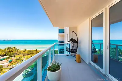 a balcony with a view of the ocean at 1 Hotel & Homes Miami Beach Oceanfront Residence Suites By Joe Semary in Miami Beach
