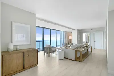 a bathroom with a sink and a desk in a room at Beach House Fort Lauderdale, A Hilton Resort in Fort Lauderdale