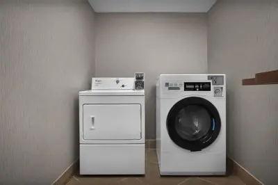 a washing machine and a washer in a room at Hampton Inn Fort Lauderdale Downtown Las Olas Area in Fort Lauderdale