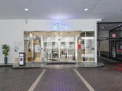 a store front of a building with a sign on it at Beautiful Apartment in the Heart of Brickell in Miami