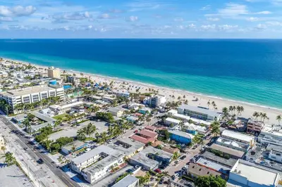 an aerial view of a beach and the ocean at Renovated studio w ocean views boardwalk steps in Hollywood
