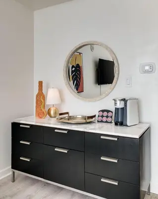 a bathroom counter with a sink and a mirror at Ocean View Balcony steps from Restaurants, Peacock Park & Marina in Miami
